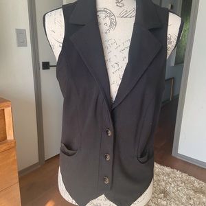 Guess 3-button fitted black vest, Tag says XL, but fits like a LG.